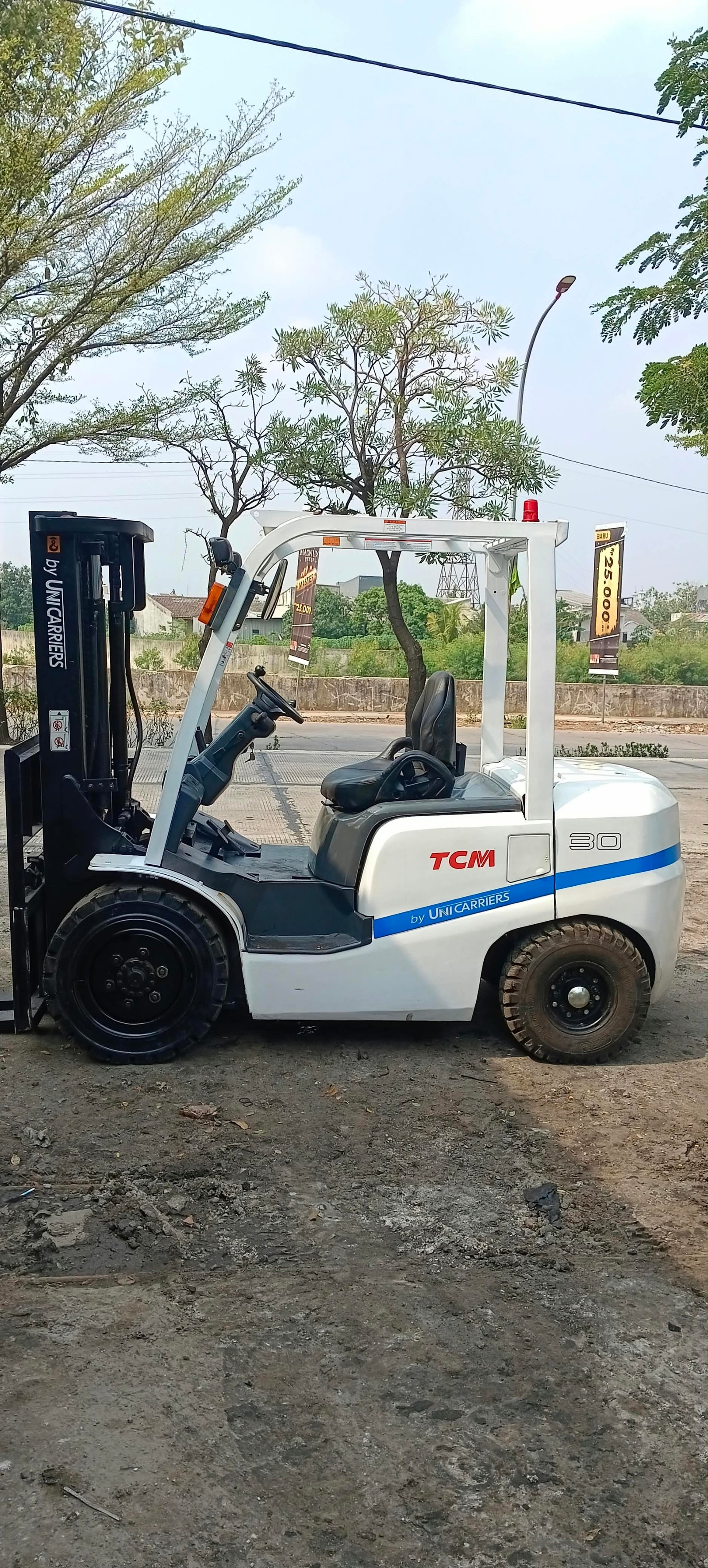 Forklift TCM FD30C3T - foto forklift bekas